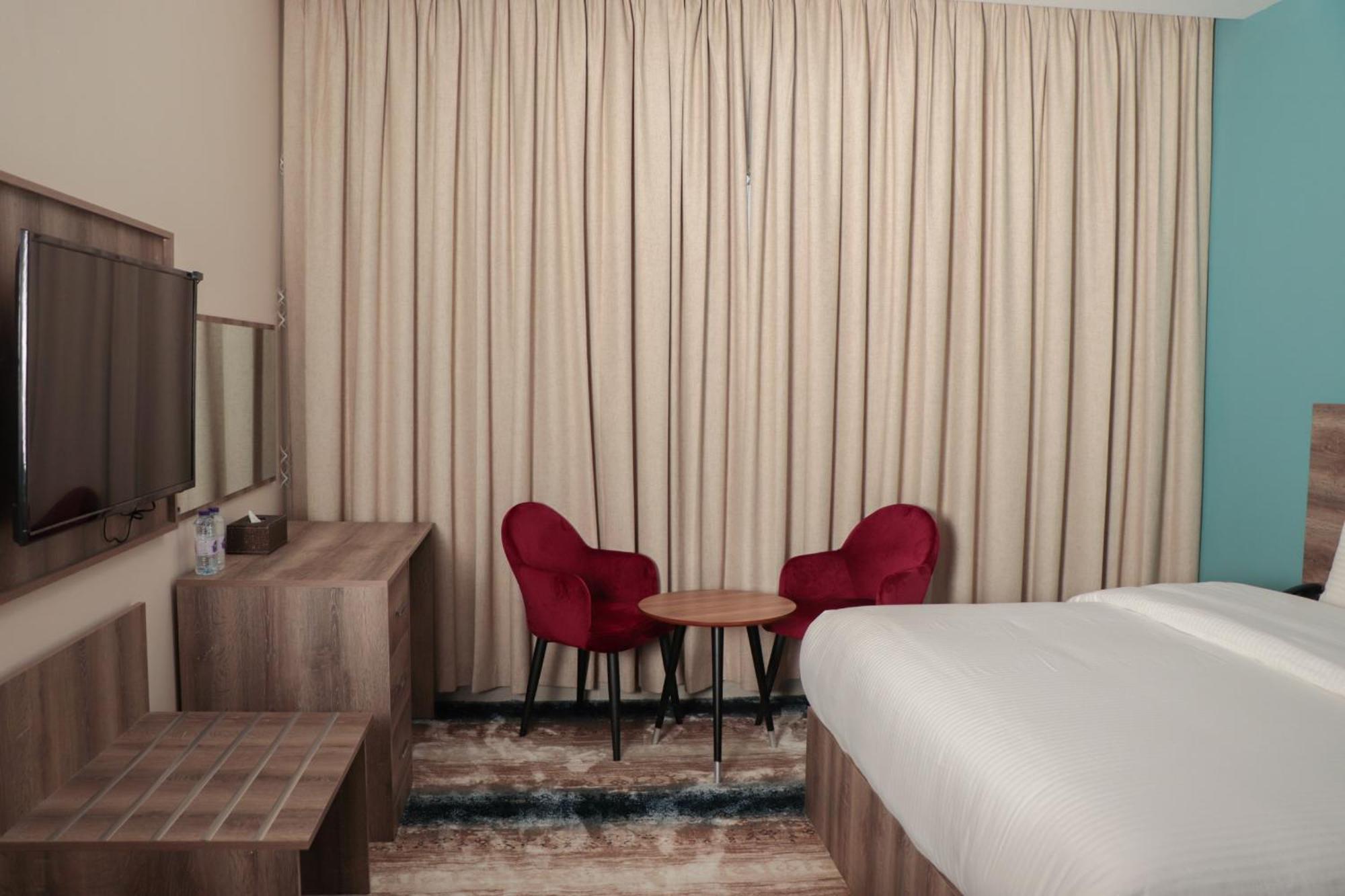 Ewann Hotel Apartments Nizwa Zimmer foto